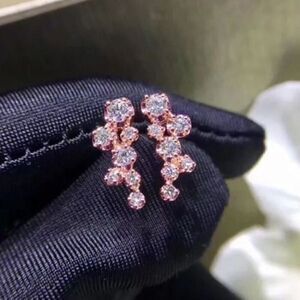 The Dainty Cluster Rose Gold stud earrings with cubic zirconia over 925.